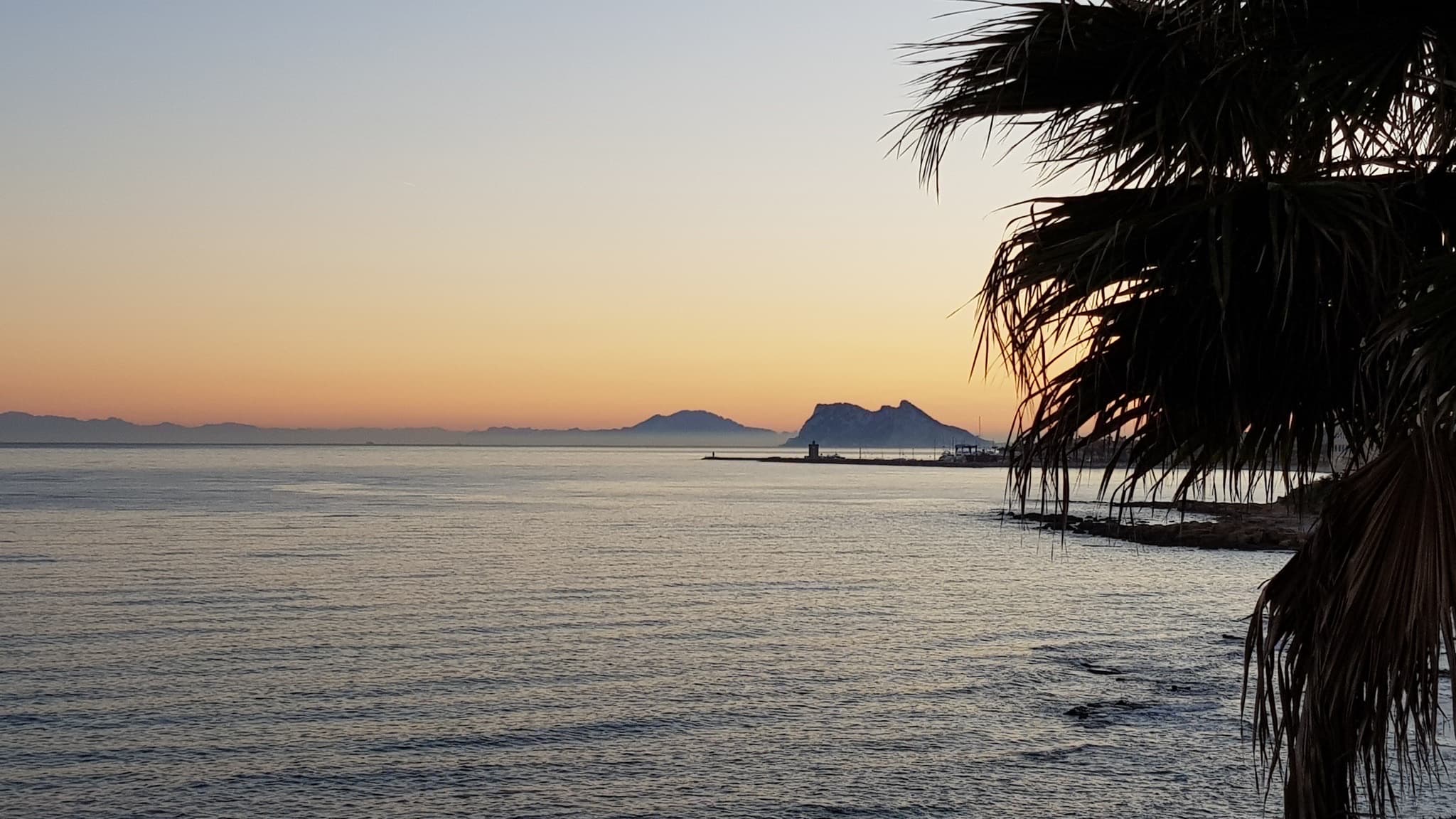 Sunset view of the sea and Gibraltar from Torreguadiaro.